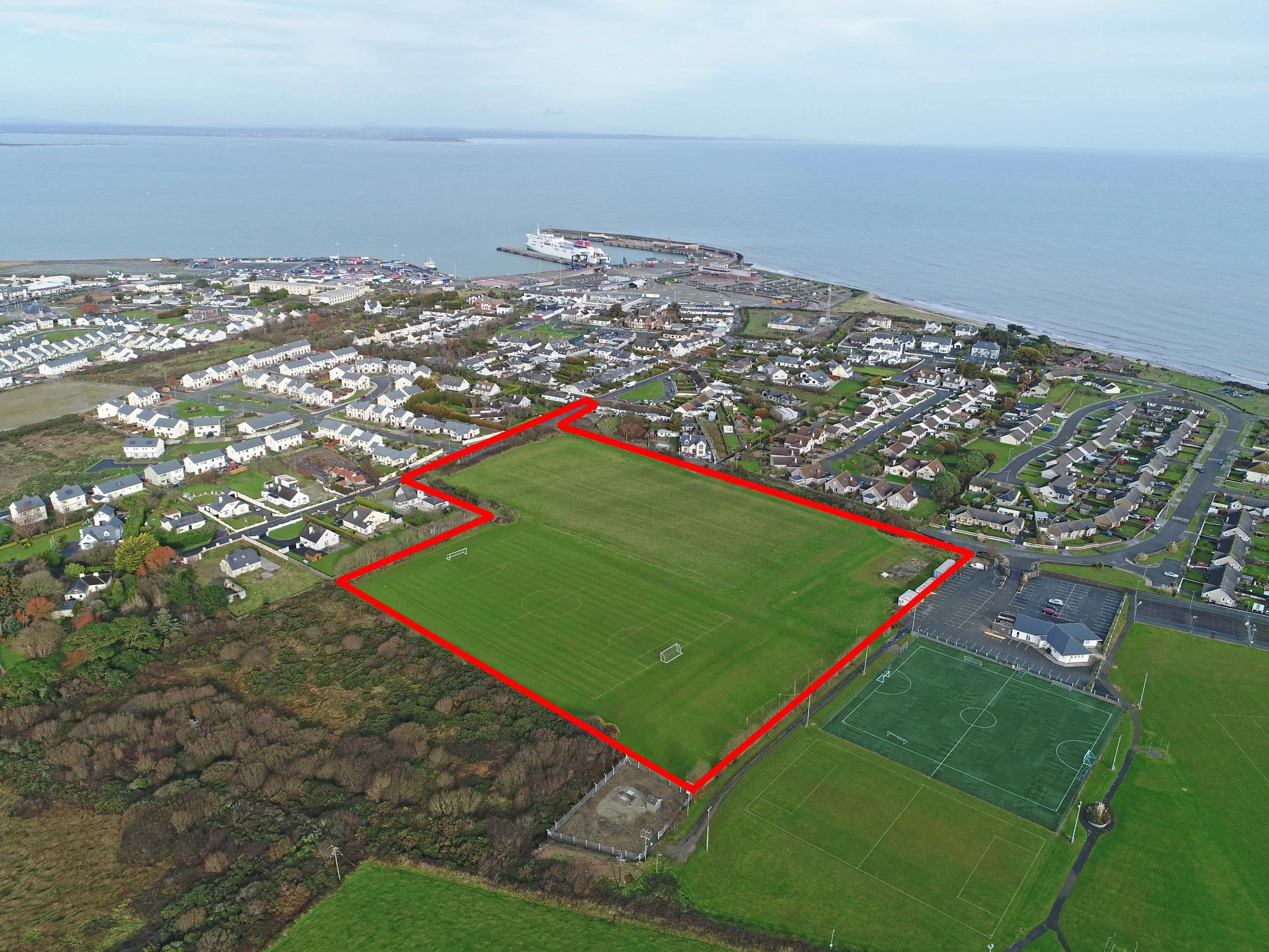 Aerial drone photograph of a development site with its boundary marked