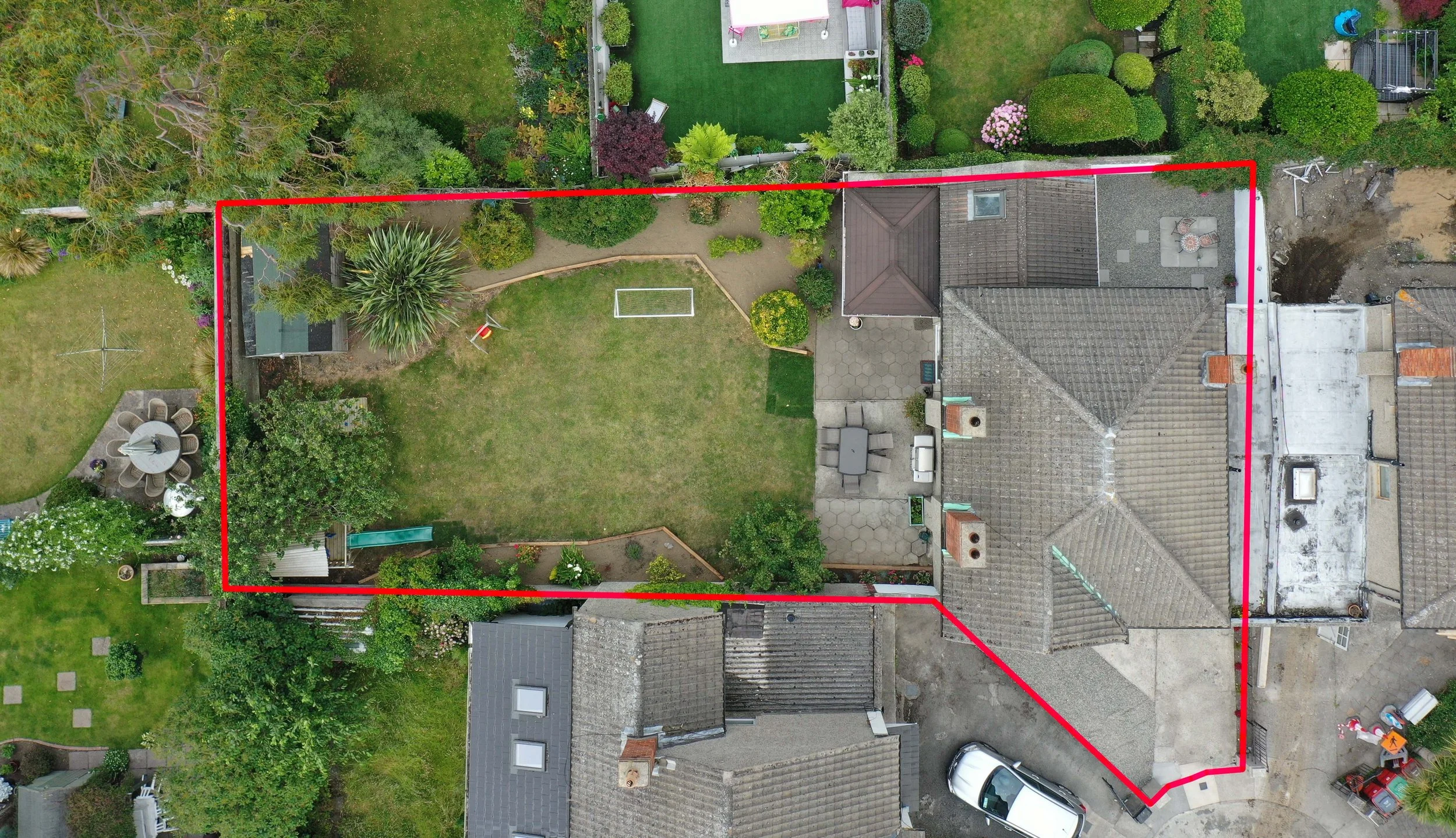 Overhead aerial image of a site with the plot boundary marked