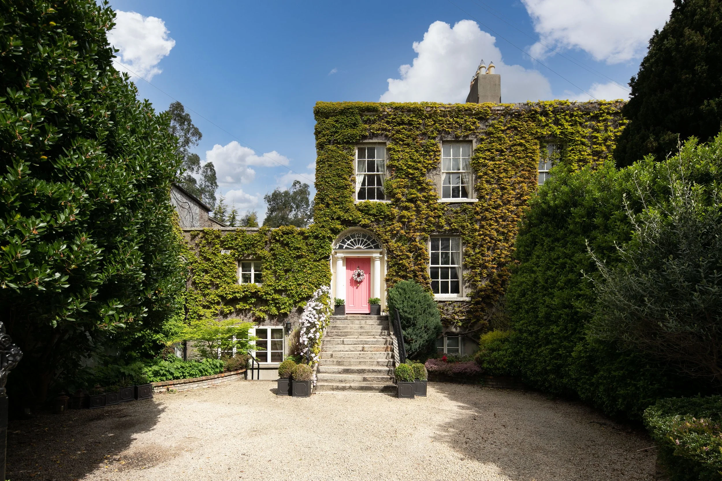 Ivy-covered Dublin house photographed from the driveway